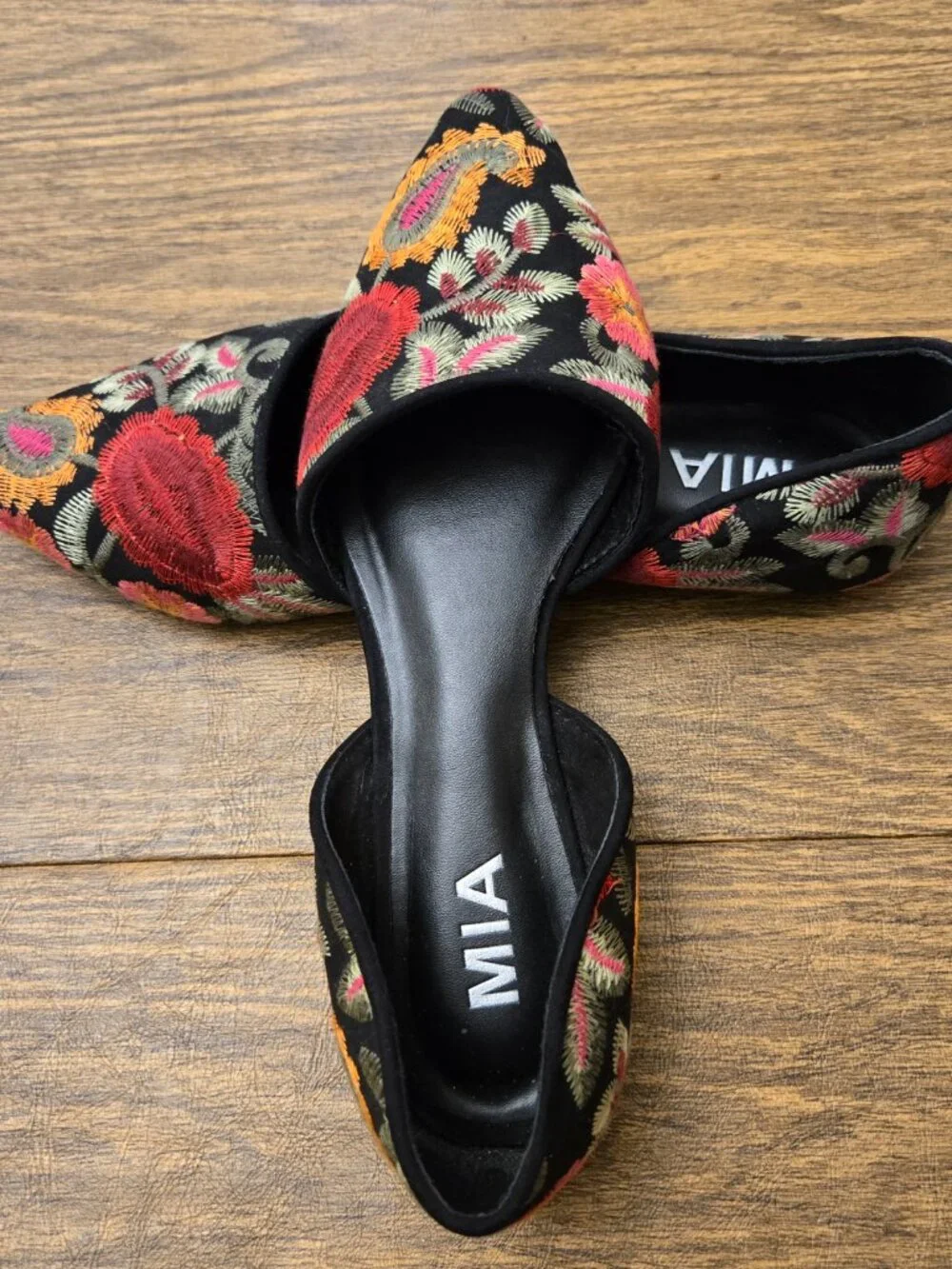 MIA Caroline Floral Embroidered d'Orsay Pointed Toe Flats on Black Background
